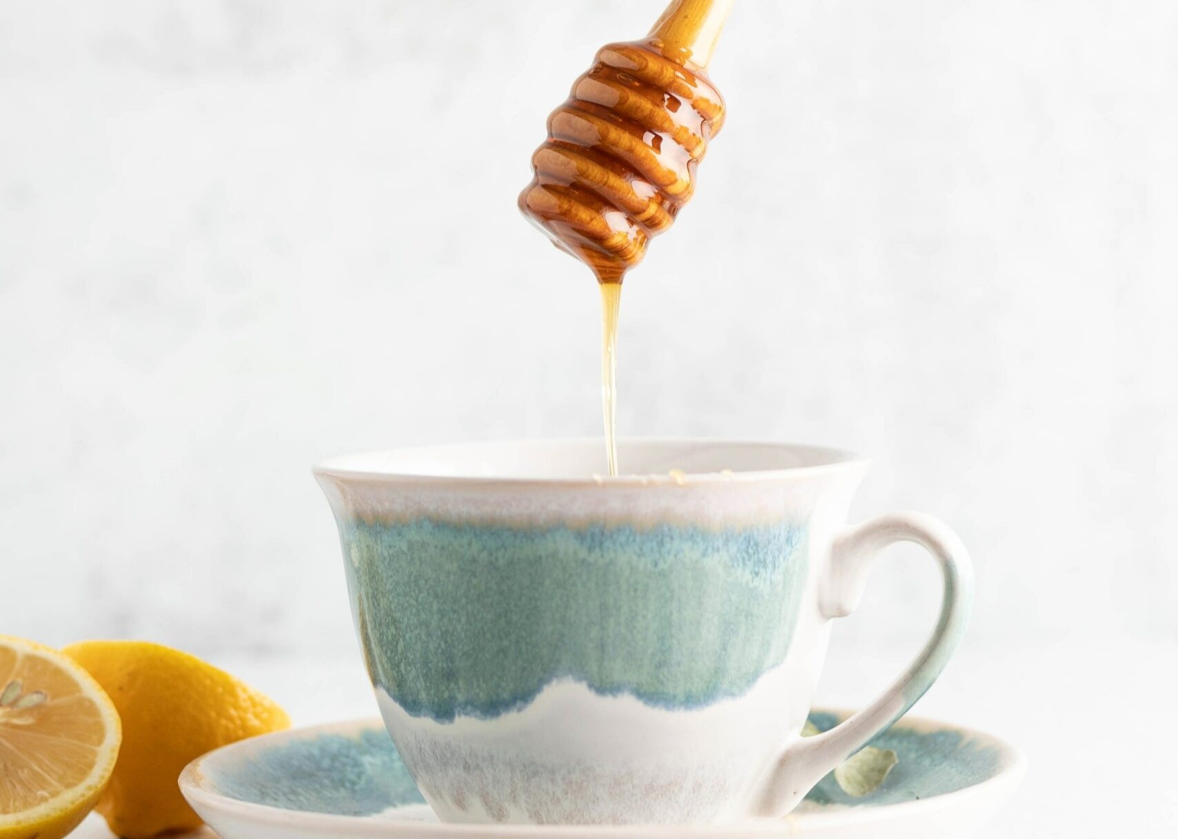 Putting honey in tea